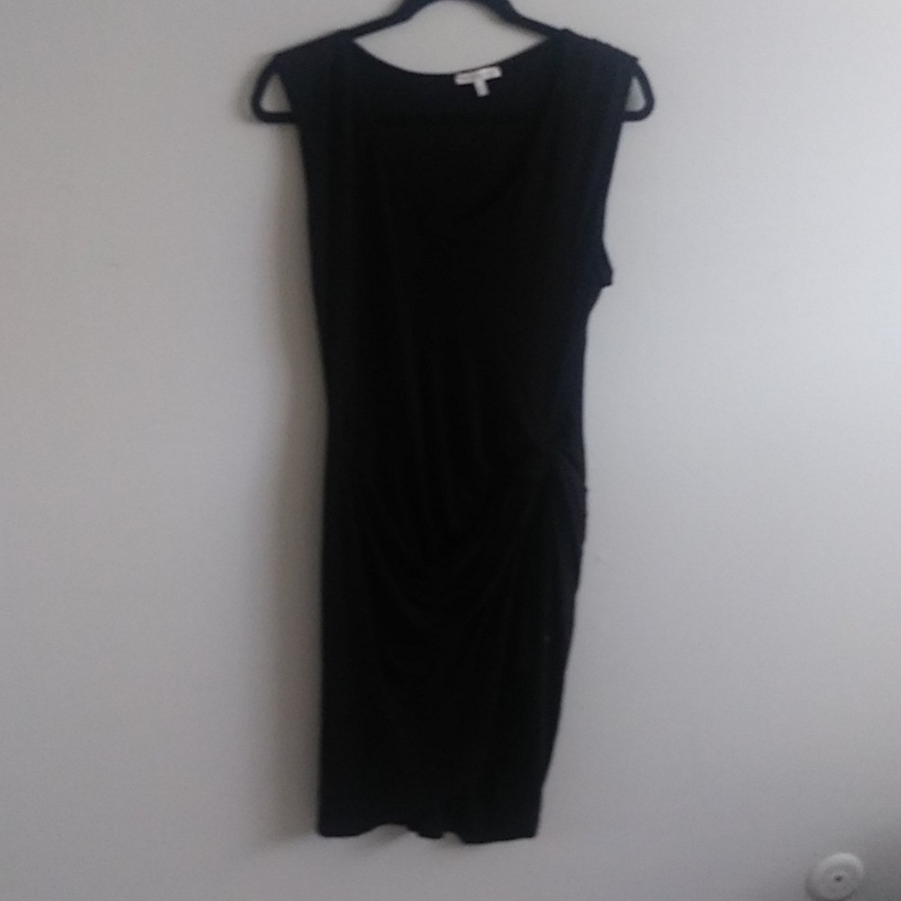Asymmetrical black tunic side knot